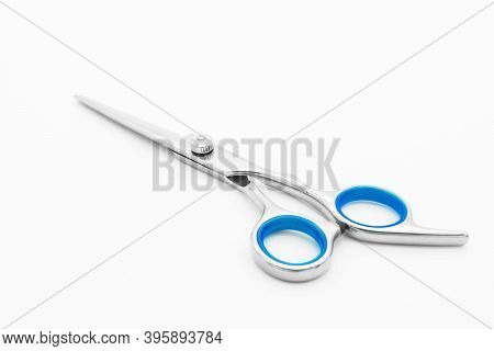 Close-up View Of The Flat Cutting Scissor Isolated On White Background.