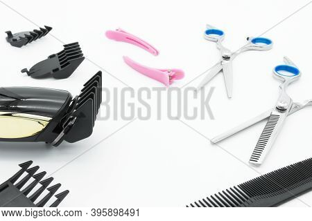 Hair Scissors Set Hairdressing Tools With Cordless Electric Hair Clipper Are Isolated On White Backg