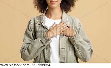 Pleased Young Female With Closed Eyes Feeling Love, Desire, Gratitude, Appreciation And Thanking Fat