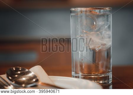 Cold Drink With Ice Cubes On Bar Or Restaurant. Selective Focus