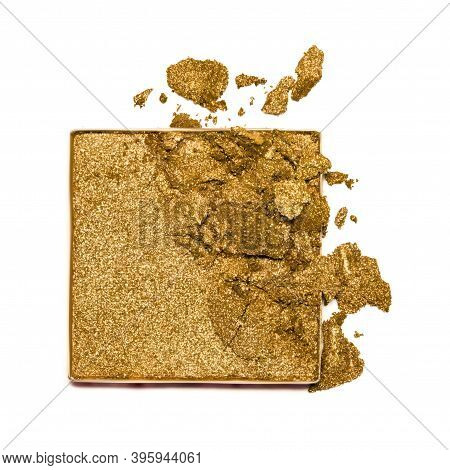 A Sample Of Golden Eye Shadow. Cosmetic Product Isolated On White Background. Closeup Of A Makeup Pr
