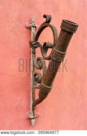 Antique Looking Flagpole Holder On The House Wall