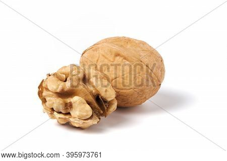 Walnut Without Nutshell And Nutshell Walnut Isolated On White