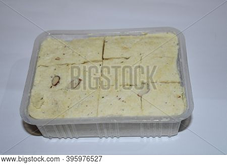 Indian Popular Famous Sweet Soanpapdi On The Plastric Tre With White Background.