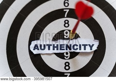 Business And Finance Concept. A Piece Of Paper With The Text Is Nailed To The Target With A Dart - A