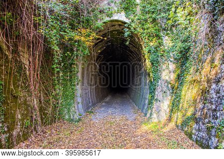Train Tunnel Entrance On The Old Abandoned Railway In Asiago, Vicenza, Italy
