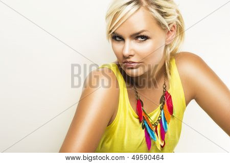 Beautiful Blond Woman With A Sultry Look
