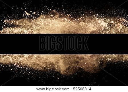 Isolated brown make-up powder in stripe shape on black background