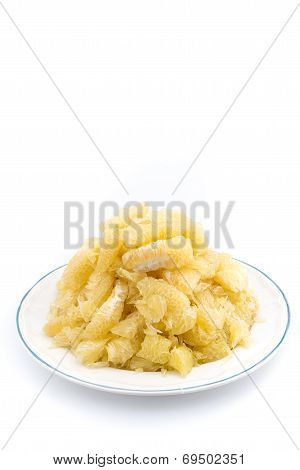 Pomelo Slices On Dish In Pyramid Shape