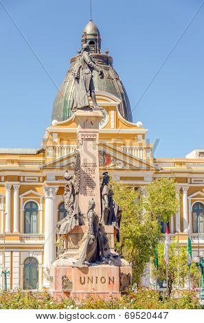 LA PAZ, BOLIVIA, MAY 8, 2014 - monument of Pedro Domingo Murillo and Government Palace of Bolivia, Plaza Murillo