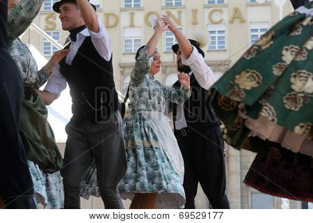 ZAGREB, CROATIA - JULY 19: Members of folk groups Nograd  from Salgotarjan, Hungary during the 48th International Folklore Festival in center of Zagreb, Croatia on July 19, 2014