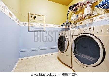 Laundry Room Interior In Light Blue And Yellow Colors