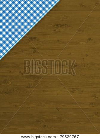 Brown background of wood with blue tablecloth