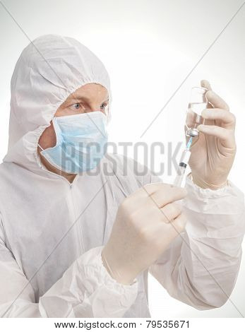 Man With Syringe And Vial