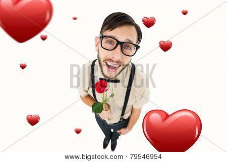 Geeky lovesick hipster holding rose against hearts