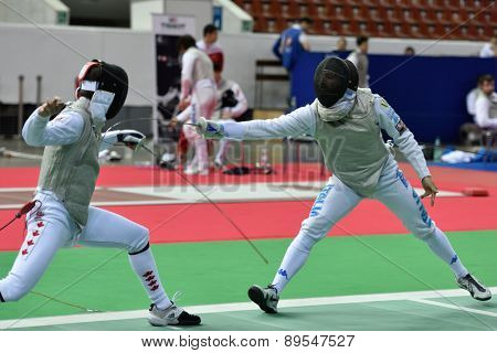 ST. PETERSBURG, RUSSIA - MAY 1, 2015: Francois-Olivier David of Canada vs Giorgio Avola of Italy in International fencing tournament St. Petersburg Foil. The tournament is the stage of FIE World Cup