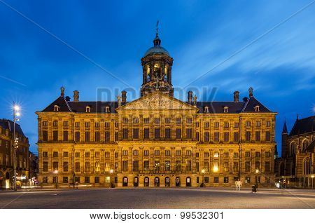 Amsterdam, Netherlands - May 7, 2015: People Visit Royal Palace At Dam Square In Amsterdam
