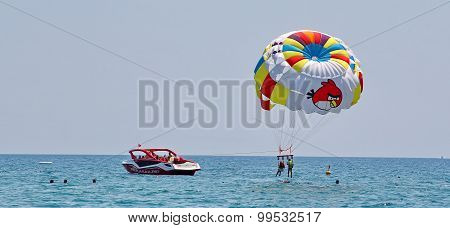 Parasailing In A Blue Sky.