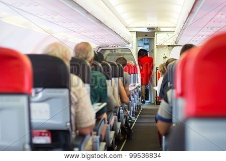 Passengers on the airplane.