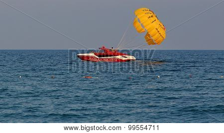 Parasailing In A Blue Sky