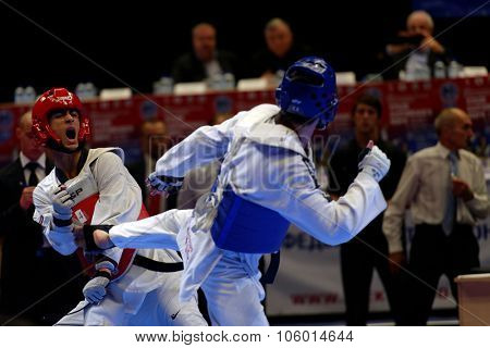 ST. PETERSBURG, RUSSIA - OCTOBER 17, 2015: Taekwondo WTF junior teams match Russia vs Iran during the martial arts festival Baltic Sea Cup in Sibur Arena. Iran won the match