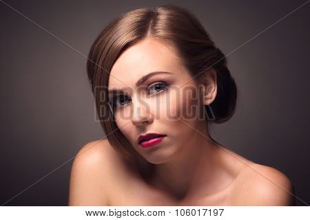 Sexy beautiful woman isolated on grey
