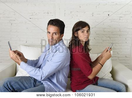 Young Antisocial Mobie Phonel Addict Couple Ignoring Each Other Using Internet Compulsively