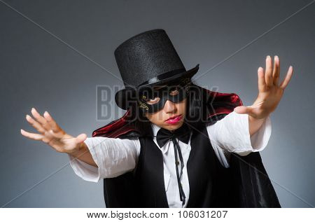 Woman magician in funny concept