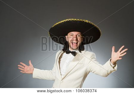 Person wearing sombrero hat in funny concept