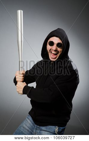 Aggressive man with basebal bat 