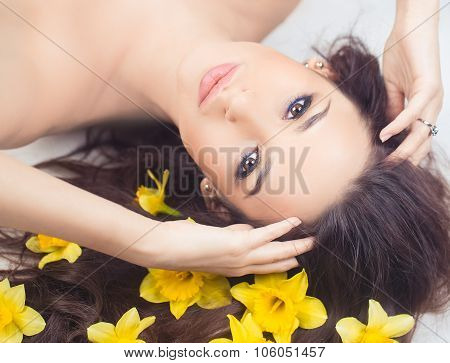 Woman With Narcis Flowers In Hair