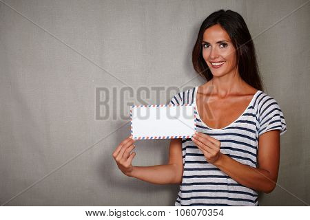 Charismatic Woman Holding Letter While Smiling