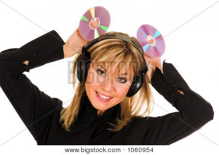 Woman Listening Music In Headphones And Holding Two Cd 
