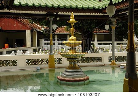 Ablution fountain at the Kampung Kling Mosque at Malacca, Malaysia
