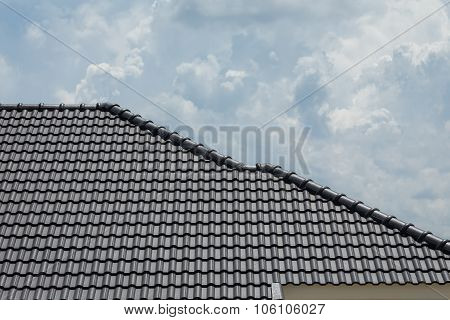 Black Tile Roof On Building Residence House