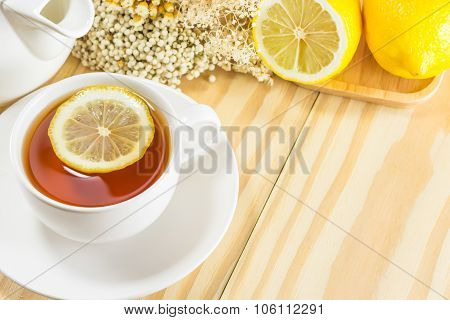 Tea With  Lemon On Wood Background,warm Toning, Selective Focus
