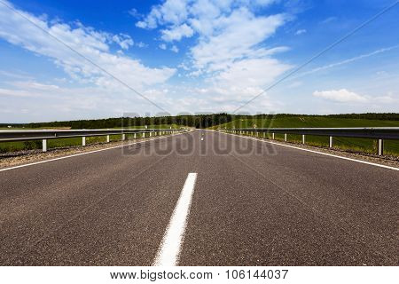Summer road . field