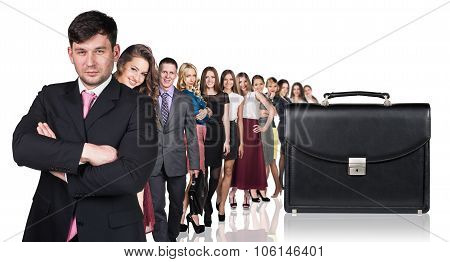 Black briefcase foreground and business peole