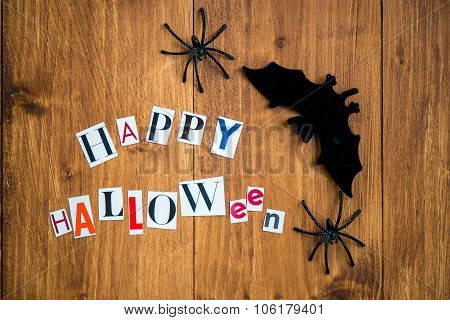 Happy Halloween Letters Cut Out From The Magazines, Bats And Black Spiders