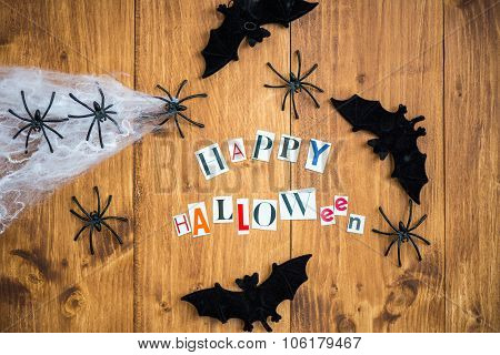 Happy Halloween Letters Cut Out From The Magazines, Bats, Web And Black Spiders