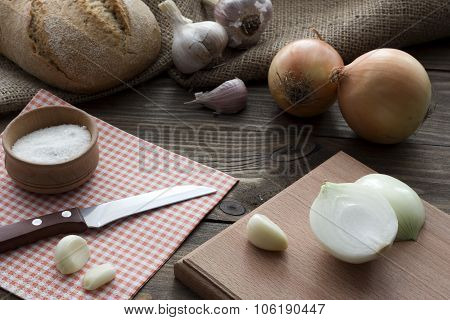 The Knife , Onion, Garlic , Bread And Salt