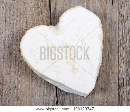 Heart shaped Neufchatel cheese on a table