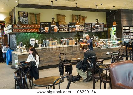 MOSCOW, RUSSIA - SEPTEMBER 24, 2014: Starbucks cafe interior in Sheremetyevo airport. Starbucks Corporation is an American global coffee company and coffeehouse chain based in Seattle, Washington