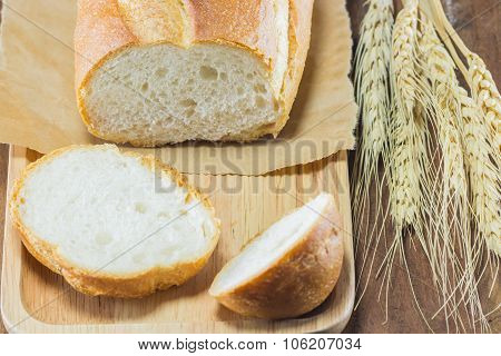 Bread And Wheat On The Wood Background, Selective Focus
