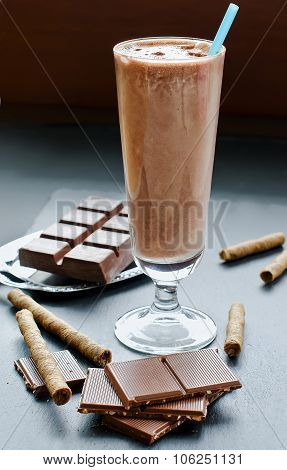 Chocolate Smoothie In Glass On Black Background