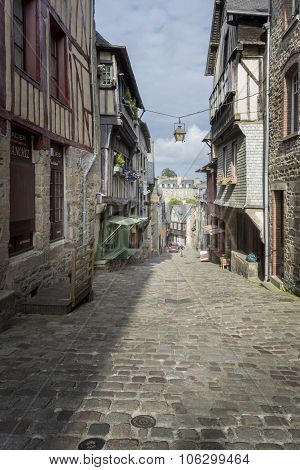Medieval Cobbled Street In Dinan, Brittany, France