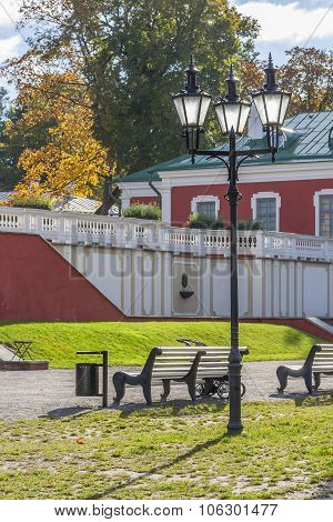 Old Lantern And Bench
