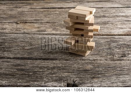 Wooden Pegs Placed In A Tower Like Structure