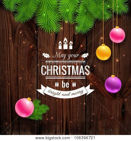 Merry Christmas greetings logo on wood.