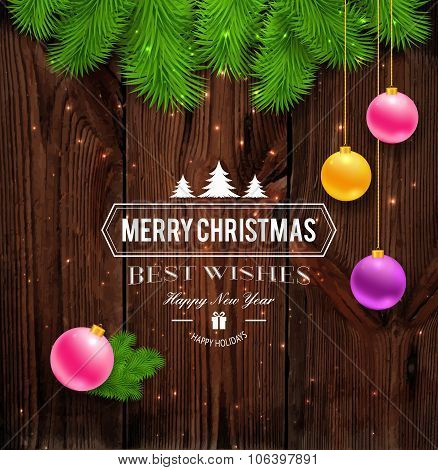 Merry Christmas greetings logo on wood.